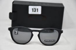 A pair of as new Oakley Pitchman R glasses Satin Black frame with Prizm Black Polarized lenses (