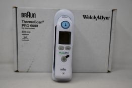 A boxed as new Welch Allyn Braun ThermoScan PRO 6000 ear thermometer with cradle.