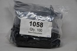 A large quantity of Tweezerman folding eyelash combs (Approximately 100 items).