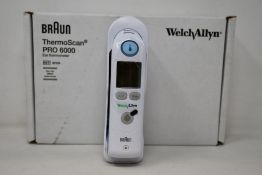 A boxed as new Welch Allyn Braun ThermoScan PRO 6000 ear thermometer with cradle.