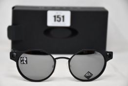 A pair of as new Oakley Deadbolt sunglasses Satin Black frame with Prizm Black Polarized lenses (