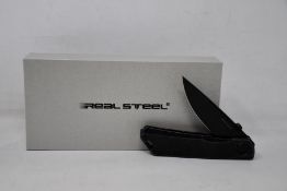 Six as new Real Steel Stella pocket knives in Blackwash.