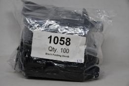 A large quantity of Tweezerman folding eyelash combs (Approximately 100 items).