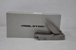 Six as new Real Steel Luna Eco pocket knives in stonewash.