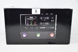 A boxed as new Line 6 HX Stomp INT P33-1 multi-effect guitar pedal.