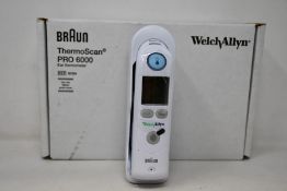 A boxed as new Welch Allyn Braun ThermoScan PRO 6000 ear thermometer with cradle.