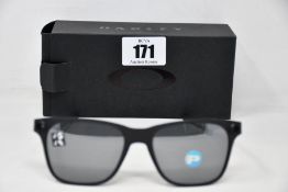 A pair of as new Oakley Apparition sunglasses Satin Black frame with Black iridium Polarized