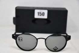 A pair of as new Oakley Deadbolt sunglasses Satin Black frame with Prizm Black Polarized lenses (