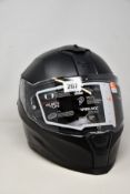 A boxed as new Nexx Helmets in Full Black MT (Model: SX.100R, Size: M).