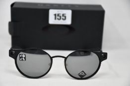 A pair of as new Oakley Deadbolt sunglasses Satin Black frame with Prizm Black Polarized lenses (