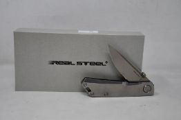 Six as new Real Steel Luna Eco pocket knives in stonewash.