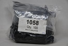 A large quantity of Tweezerman folding eyelash combs (Approximately 100 items).