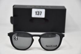 A pair of as new Oakley Pitchman R glasses Satin Black frame with Prizm Black Polarized lenses (