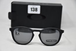 A pair of as new Oakley Pitchman R glasses Satin Black frame with Prizm Black Polarized lenses (