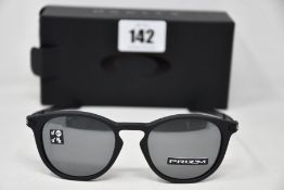 A pair of as new Oakley Pitchman R glasses Satin Black frame with Prizm Black Polarized lenses (