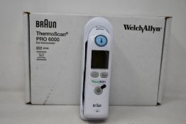 A boxed as new Welch Allyn Braun ThermoScan PRO 6000 ear thermometer with cradle.