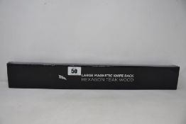 An as new Edge of Belgravia hexagon teak wood large magnetic knife rack.