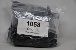 A large quantity of Tweezerman folding eyelash combs (Approximately 100 items).