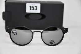 A pair of as new Oakley Deadbolt sunglasses Satin Black frame with Prizm Black Polarized lenses (