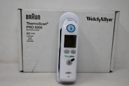 A boxed as new Welch Allyn Braun ThermoScan PRO 6000 ear thermometer with cradle.