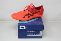 A pair of as new Asics High Jump Pro trainers (UK 9.5).