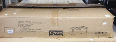 A Kyoto Davis storage ottoman in charcoal.
