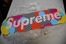 A Hylus 'This is not Supreme' colourful acrylic glass art board.