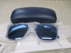 A pair of as new Lacoste sunglasses.