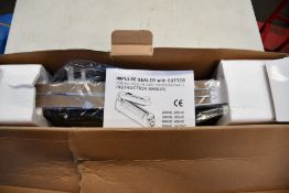 A Pacplus IS300C 300mm Single Bar Heat Sealer with cutter.