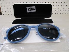 A pair of as new Calvin Klein sunglasses.