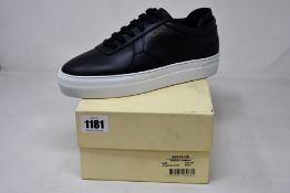 A pair of as new Axel Arigato Platform sneakers (UK 5).