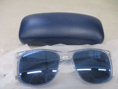 A pair of as new Lacoste sunglasses.