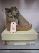 A pair of women's boxed as new A.S 98 high ankle boots in pale green (EU 38).