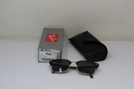 A pair of as new Ray Ban Clubmaster Square sunglasses.