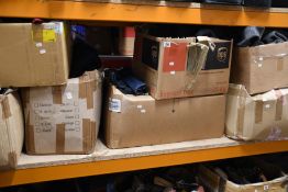 Seven boxes of pre-owned clothing and related items.