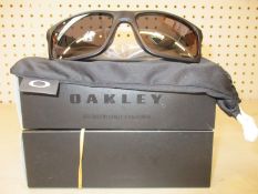 Two boxed as new Oakley Mainlink XL sunglasses matte black frame with prizm black polarized
