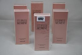 Six boxed as new Calvin Klein Eternity Moment eau de parfum (100ml).