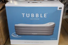A boxed as new Tubble Royale inflatable bathtub.