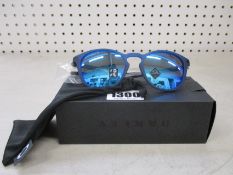 A boxed as new pair of Oakley Pitchman R glasses matte translucent blue frame with Prizm Sapphire