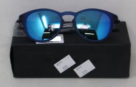 A boxed as new pair of Oakley Pitchman R glasses matte translucent blue frame with Prizm Sapphire