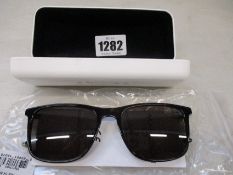 A pair of as new Calvin Klein sunglasses.