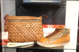 A pair of women's as new Pikolinos Lagos ankle boots (EU 35) together with a Pikolinos Faura bag.