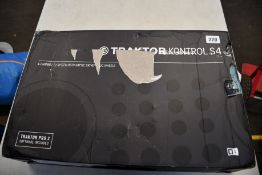 A Native Instruments Traktor Kontrol S4 Mk3 DJ Controller.