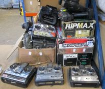 A large quantity of pre-owned RC Car/Plane/Boat controllers to include Futaba, Acoms, Topgun Park
