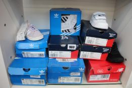 Eight pairs of children's/infants as new trainers to include Adidas, Reebok and New Balance.