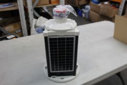 A Sealite BargeSafe solar 3NM LED barge light.