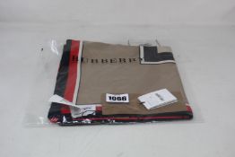 An as new Burberry 8016226 Monogram Icon scarf.