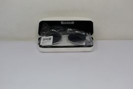 A pair of as new Calvin Klein sunglasses.