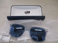 A pair of as new Lacoste sunglasses.