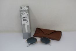 A pair of as new Ray Ban sunglasses.